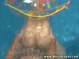 Asian cutie getting pussy pounded in pool and loves it